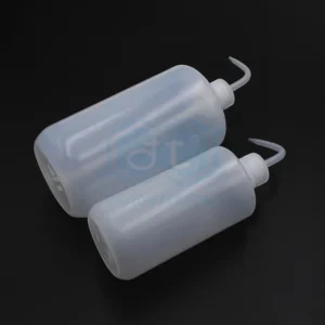 PP/LDPE plastic bottle containing liquid medicine including measuring syringe; capacity 100ml - 500ml